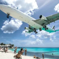 Plane lands over Maho Beach in St. Maarten in 2025